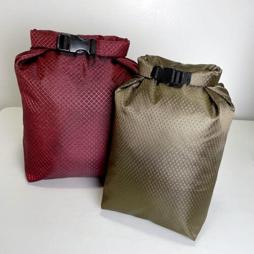two roll-top bags